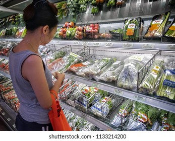 BANGKOK, THAILAND - JUNE 09: Unidentified Female Customer Shops In The Produce Section Of Foodland Supermarket In Bangkok On June 09, 2018.