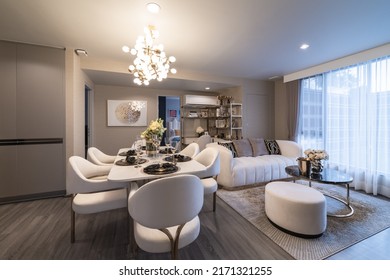 BANGKOK, THAILAND - June 16, 2022 : Luxury condominium dining room, kitchen interior with dining table for a new family. on March June 16, 2022 in Bangkok, Thailand
