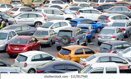 BANGKOK, THAILAND - JUNE 19,2018 : Many cars parking in the outdoor parking lot area at Chatuchak district,downtow of Bangkok,Thailand