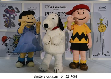 Bangkok, Thailand – June 21, 2019: Costume Of Snoopy, Charlie Brown And Lucy Van Pelt From Cartoon The Peanuts Movie By Charles M. Schulz At Siam Paragon Shopping Mall