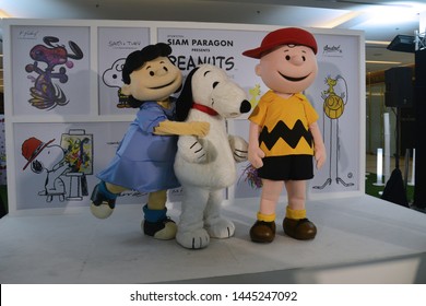 Bangkok, Thailand – June 21, 2019: Costume Of Snoopy, Charlie Brown And Lucy Van Pelt From Cartoon The Peanuts Movie By Charles M. Schulz At Siam Paragon Shopping Mall