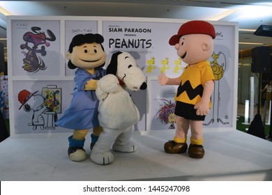 Bangkok, Thailand – June 21, 2019: Costume Of Snoopy, Charlie Brown And Lucy Van Pelt From Cartoon The Peanuts Movie By Charles M. Schulz At Siam Paragon Shopping Mall