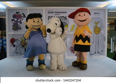 Bangkok, Thailand – June 21, 2019: Costume Of Snoopy, Charlie Brown And Lucy Van Pelt From Cartoon The Peanuts Movie By Charles M. Schulz At Siam Paragon Shopping Mall