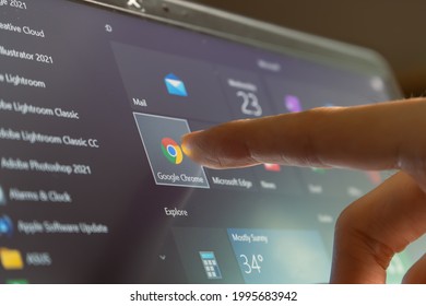 Bangkok, Thailand - June 23, 2021 : Computer User Touching On Google Chrome, A Web Browser Developed By Google, Icon On Windows 10 To Open The Program.