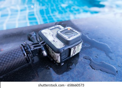 BANGKOK, THAILAND . JUNE 3 ,2017. GoPro Hero 5 Black With Accessories And Water At The Pool. Gopro Camera Is Popular Action Cam In The World .