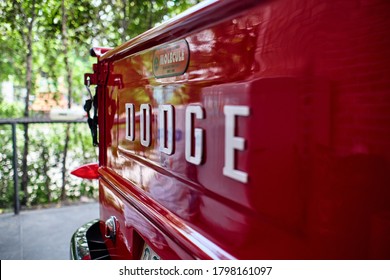 BANGKOK, THAILAND - JUNE 30, 2019: Classic Dodge pickups truck with red & black paint. The trucks known as Dodge Job-Rated trucks. Design with Art Deco styled front sheetmetal. Vintage car background.