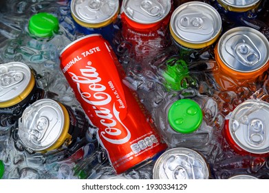 Bangkok, Thailand - March 1, 2020 : Coca-cola Can And Ice Soft Drink Cans On Ice In The Bucket.