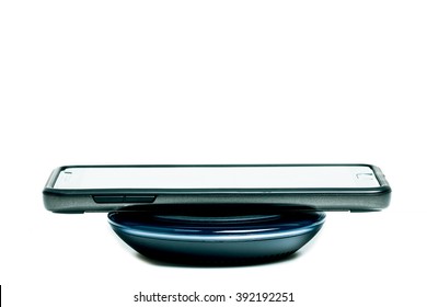 Bangkok, Thailand- March 14, 2016:Samsung Wireless Charging Pad with blue black color on white background for charger Samsung galaxy smartphone Note5 and more,Product by Samsung Electronics.  