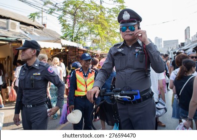 BANGKOK, THAILAND - MARCH 15 : Unidentified Thai police drives Onlywheel at Jatujak or Chatuchak Market on March 15, 2015 in Bangkok, Thailand. Jatujak Market is the largest market in Thailand.