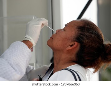 Bangkok  Thailand - March 17 2021 : A Thai Woman Receives Nasal Swap Test For Covid-19