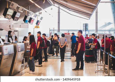 Bangkok, Thailand - March, 2019: Group of Passengers line up at China Airlines check in counter at Suvarnabhumi Airport (VTBS)
