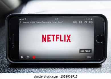 Bangkok, Thailand - March 22, 2018: Netflix And Chill, Netflix Open On An IPhone Sitting On The Dash Of A Car