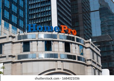 Bangkok Thailand - March 26, 2020 : A sign logo above the office building's  facade wall  of  HomePro in Bangkok.