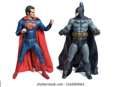 Bangkok, Thailand - March 30, 2016 : Studio Shot Of Batman And Superman  Figurine Toys Character From Movie Franchise. They Are Superheros Who Appears In American Comic Books Published By DC Comics