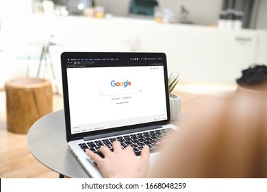 Bangkok. Thailand. MARCH 4,2020 :A woman is typing on Google search engine from a laptop. Google is the biggest Internet search engine in the world.