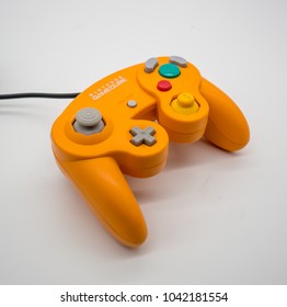 Bangkok, Thailand - March 7, 2018: Nintendo Gamecube Controller In Orange Color, Vintage Portable Game By Nintendo. Illustrative, Editorial.