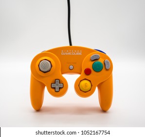 Bangkok, Thailand - March 7, 2018: Nintendo Gamecube Controller In Orange Color, Vintage Portable Game By Nintendo. Illustrative, Editorial.