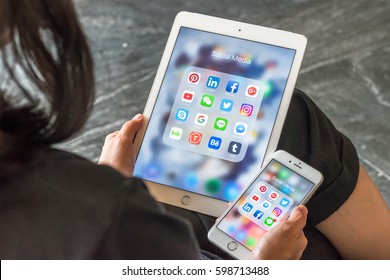 BANGKOK, THAILAND - March 8, 2017: Social Media App Icons On Ipad, Iphone 7 Smart Phone Touchscreen Mobile Internet Technology Lifestyle In Digital Age.
