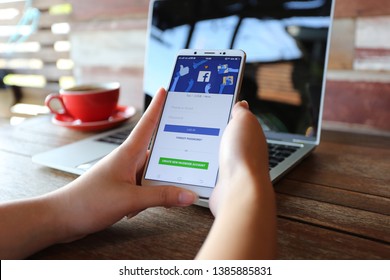 Bangkok, Thailand : May 01, 2019, Woman Hand Using Vivo V7 With Facebook Social Media App And Create New Facebook Account Or Log In, Typing Message Or Checking Newsfeed On Social Networks 