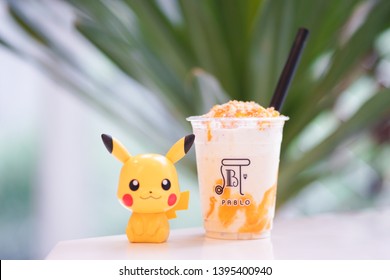 Bangkok, Thailand - May 12, 2019 : A Photo Of Pablo Smoothie Classic Cheese Tart With Pikachu, A Famous Character From Pokemon Detective Pikachu. Pablo Is Japanese Premium Tart Shop And Cafe.