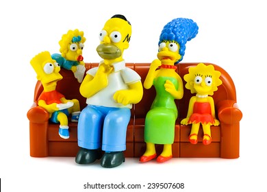 Bangkok, Thailand - May 13, 2014 : Simpsons Family On Sofa And See The Scary Movie Figure Toy Character. There Are Plastic Toy Sold As Part Of The Burger King Toys.