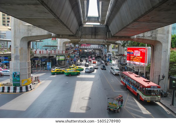 Bangkok, Thailand May 2015.\
Buses, motor vehicles, tourists on the streets of the modern Asian\
city. 