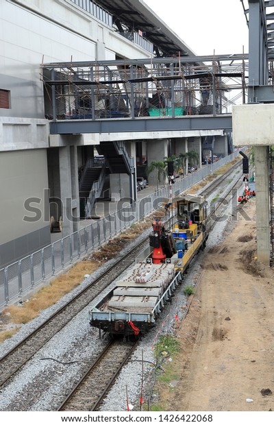BANGKOK THAILAND - MAY 2019 : The rails\
maintaining machine car stand by for making maintainance the rail\
at rail to the north bangkok\
thailand.