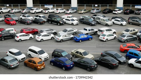 Bangkok, Thailand - May 23, 2020: Cars parked in outdoor parking lot at Mo Chit BTS station.