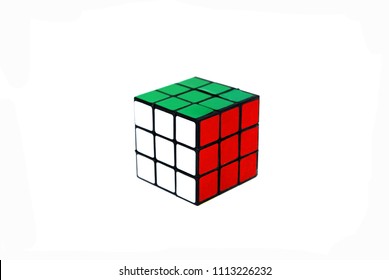 Bangkok Thailand -May 27 2018 : RUBIK CUBE Puzzle Is Take A Photo On White Mini Studio Background . It Is White , Green And Red Color Surface.