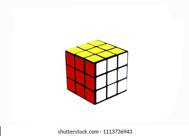 BANGKOK THAILAND -May 27 2018 : Rubik's Cube Puzzle Is Take A Photo On  White Studio Background..It Is White , Yellow And Red Color