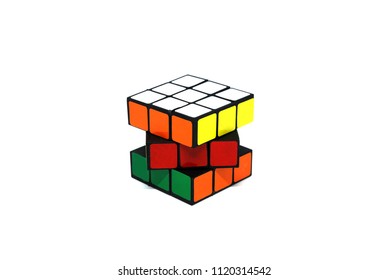 BANGKOK THAILAND -May 27 2018 : Rubik's Cube Puzzle Is Take A Photo On  White Studio Background.It Is White , Yellow And Red Color