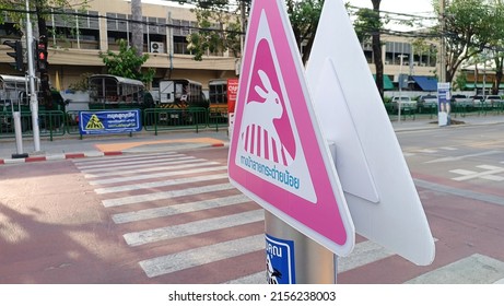 Bangkok, Thailand, May 3 2022: close up of a rabbit sign at a road crossing path