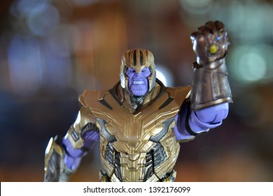 Bangkok, Thailand - May 4, 2019: Mini Model of Thanos with The Mighty Glove Infinity Gauntlet from A Marvel Superhero Movie Avengers 4: Endgame Displays at the Theater