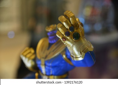 Bangkok, Thailand - May 4, 2019: Mini Model of Thanos with The Mighty Glove Infinity Gauntlet from A Marvel Superhero Movie Avengers 4: Endgame Displays at the Theater