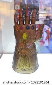 Bangkok, Thailand - May 4, 2019: Model Of Thanos Mighty Glove Infinity Gauntlet From A Marvel Superhero Movie Avengers 4: Endgame Displays At The Theater