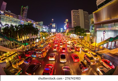  BANGKOK THAILAND- May 5,2015: big automobile stopper on one of the central streets . The basic problem of the Asian megacities is the complicated traffic.The front of Central World Shopping center