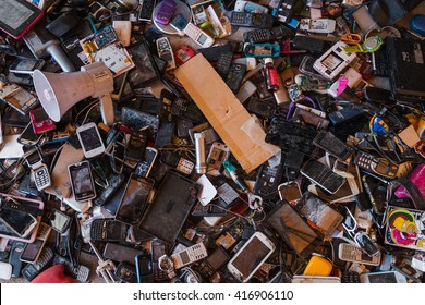 BANGKOK THAILAND - MAY 6 2016 : Many pile high broken  electronic leave  in second hand reuse shop in Bangkok