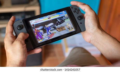 Bangkok, Thailand - May30, 2019 : Gamer Playing Street Fighter Ii Game On Nintendo Switch. 