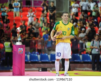 BANGKOK, THAILAND - NOV 18: Fernandinho Of Brazil Is Seen With The Adidas Bronze Boot Award After The FIFA Futsal World Cup Final At Indoor Stadium Huamark On November 18, 2012 In Bangkok, Thailand.