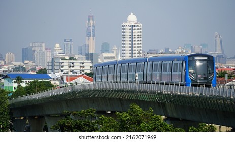 Bangkok, Thailand - November 15, 2020: Bangkok Metro Train Blue Line Running On Sky Track With Bangkok Skyscraper In Background