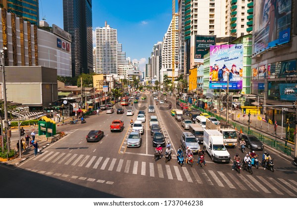 Bangkok,\
Thailand - November 16, 2019 :  Traffic moment in afternoon on\
Asoke junction at downtown of Bangkok,\
Thailand