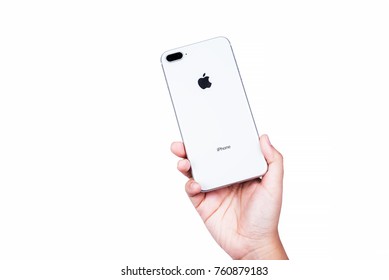 Bangkok, Thailand - November 19, 2017:Brand new generation of Apple iPhone  8 plus with box isolate on woman hand holding with white background. iPhone is most popular of smartphone in the world.