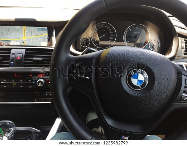 BANGKOK, THAILAND- NOVEMBER 19, 2018: Close up\
Interior dashboard decoration and steering wheel design of \'BMW X4\
F26\' luxury and sport utility\
car