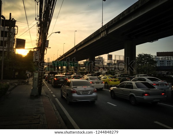 Bangkok /\
Thailand - November 19, 2018 : Rush hour, traffic jam when people\
come back home, after work on the road.\
