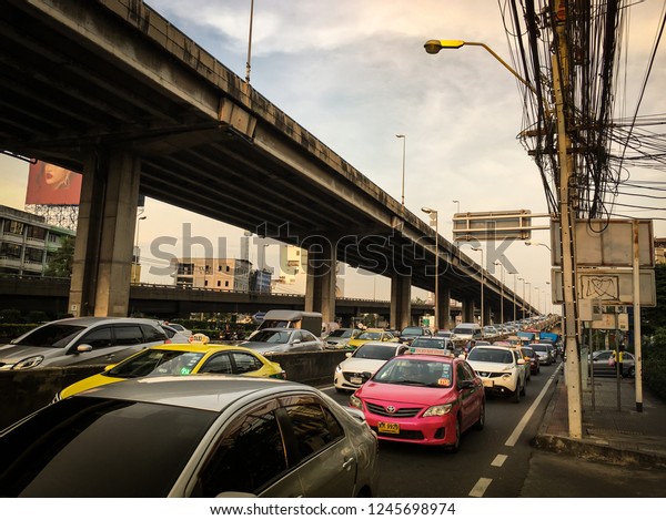 Bangkok /\
Thailand - November 19, 2018 : Rush hour, traffic jam when people\
come back home, after work on the road. \
