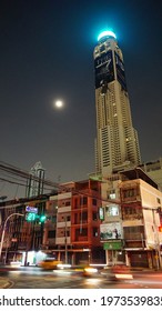Bangkok, Thailand - November 23, 2020: Baiyoke Sky Hotel or Baiyoke II Tower and commercial buildings from Ratchaprarop Road at night