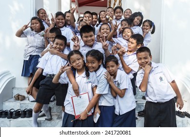 BANGKOK, THAILAND - NOVEMBER 28: Unidentified School Children On November 28, 2013 At Wat Nangnong Temple. Education In Thailand Is Provided By The Thai Government Through The Ministry Of Education.