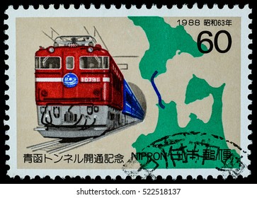 BANGKOK, THAILAND - OCTOBER 08, 2016: A Postage Stamp Printed In Japan Shows Electric Locomotive And Map For Seikan Tunnel, Series 