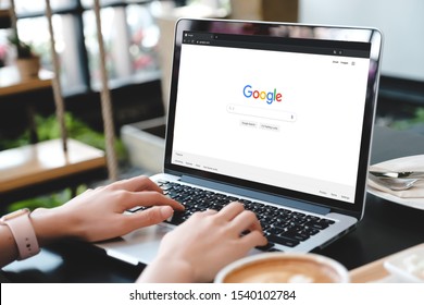 Bangkok. Thailand. October  15,2019  :A woman is typing on Google search engine from a laptop. Google is the biggest Internet search engine in the world.