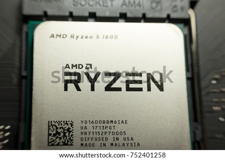 Bangkok, Thailand - October 19, 2017: Close-up of AMD Ryzen 5 1600 CPU on motherboard. It is a high-performance microprocessor introduced by AMD in 2017.